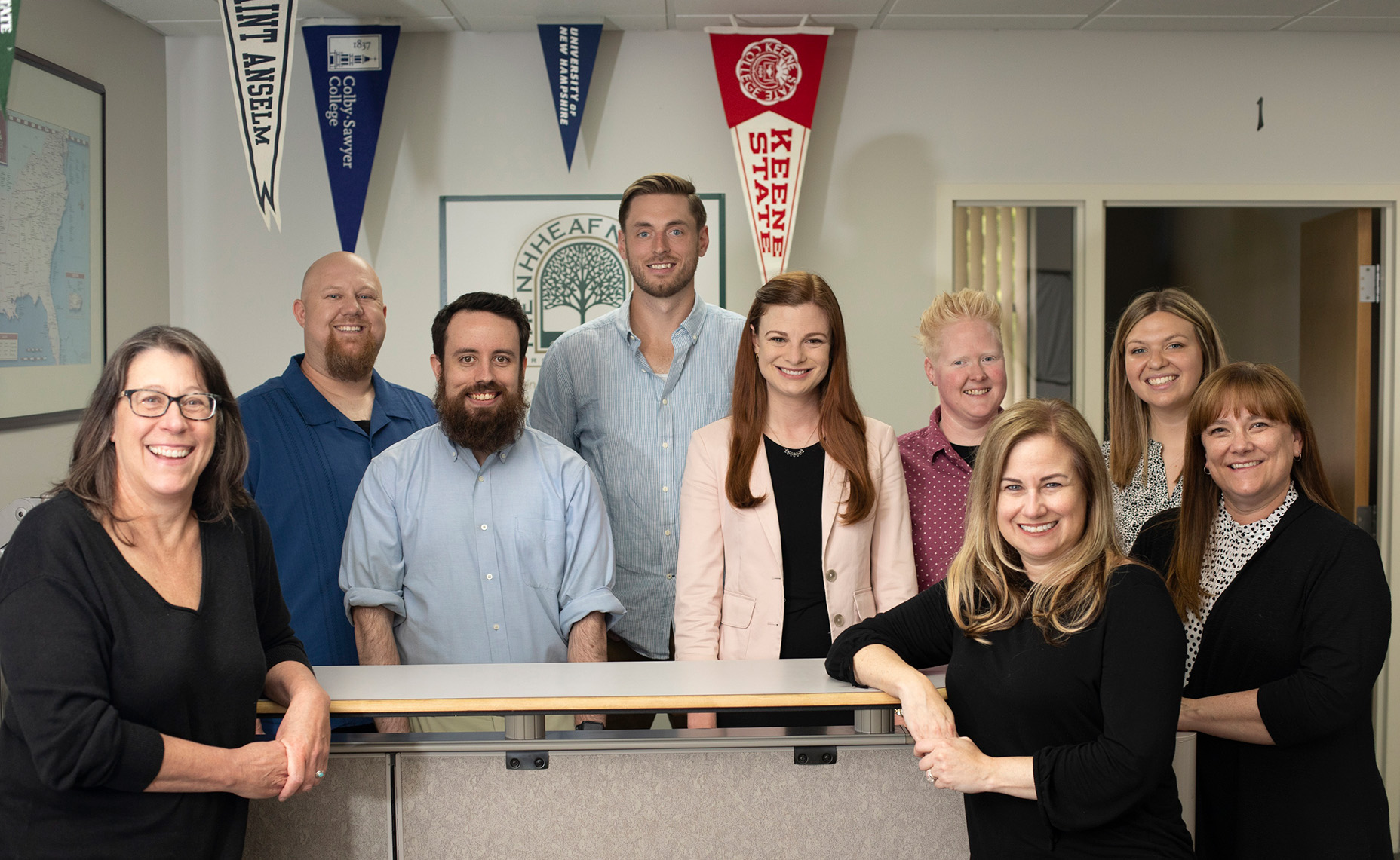 Granite Edvance college and career counselors standing around a desk